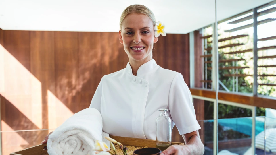female massage therapist or masseuse in a hotel