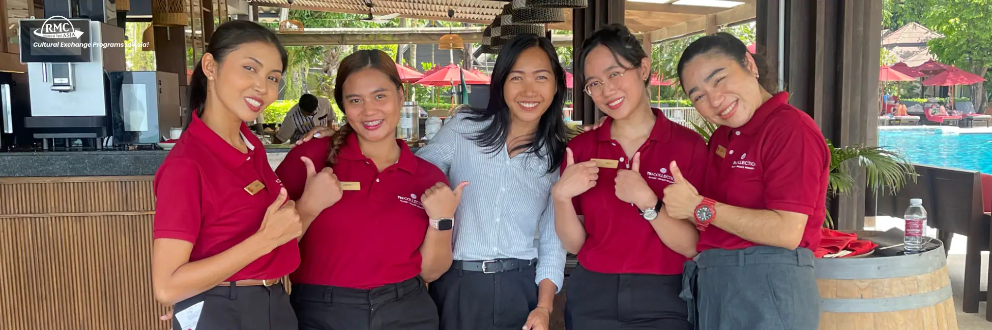 Young hospitality professional stepping into a luxury hotel lobby abroad, beginning their career journey with RMC Asia