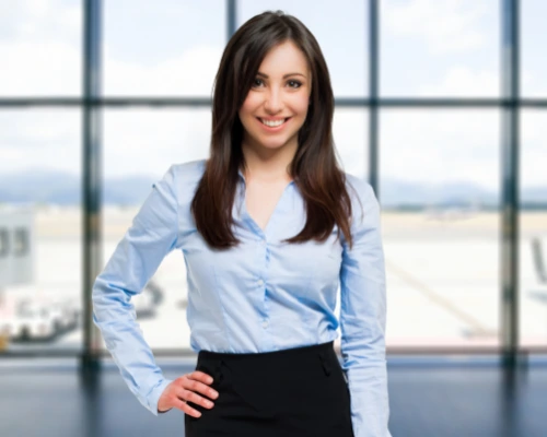 smiley young female manager looking at camera